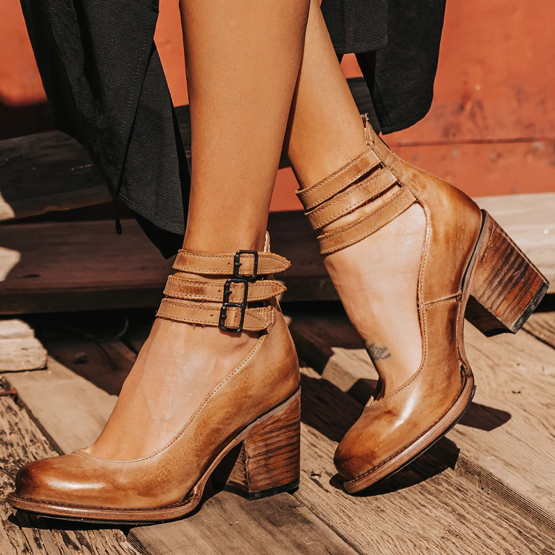 Sophisticated women's block heel sandals, strappy design & adjustable ankle closure.