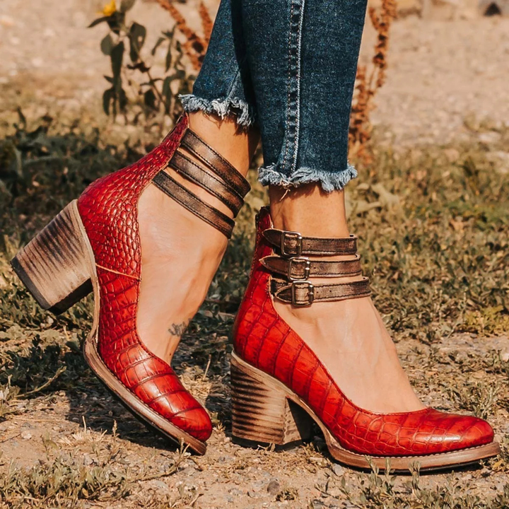 Elegant women's footwear: strappy ankle strap block heel sandals for graceful steps.
