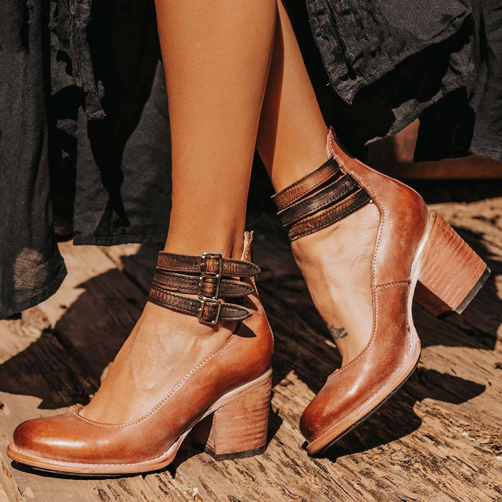 Contemporary women's strappy block heel sandals with an eye-catching ankle strap.