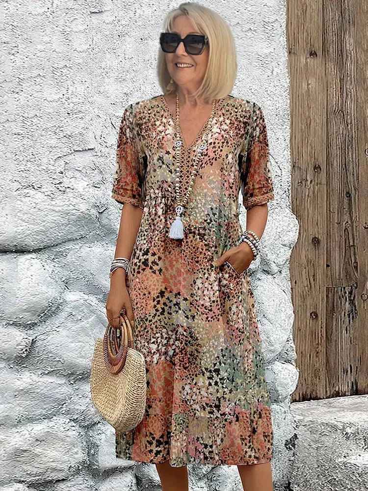 Stylish women's printed V-neck A-line midi dress, perfect for a comfortable and fashionable summer daily wear.