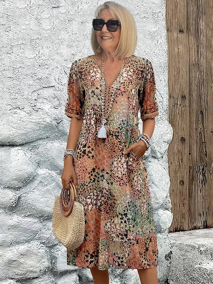 Stylish women's printed V-neck A-line midi dress, perfect for a comfortable and fashionable summer daily wear.