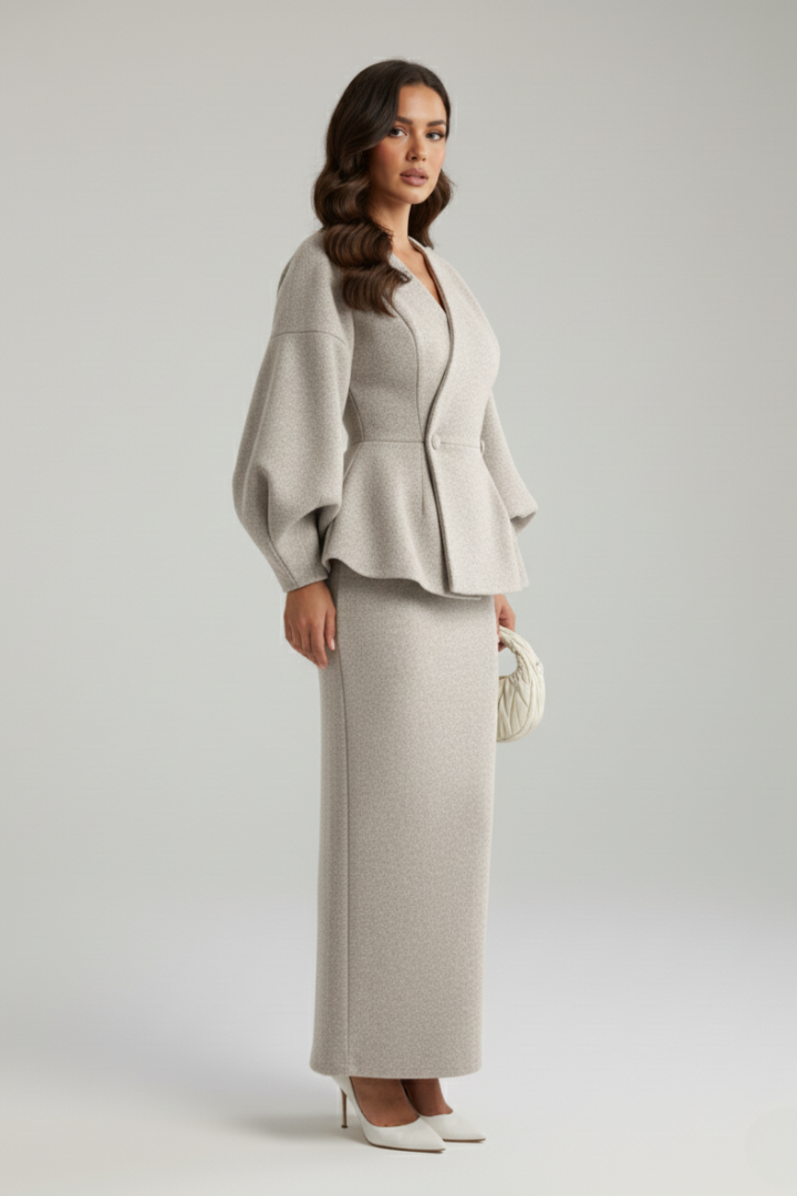 Elegant beige midi skirt and matching puff sleeve blazer set for women, ideal formal wear or occasion dress.