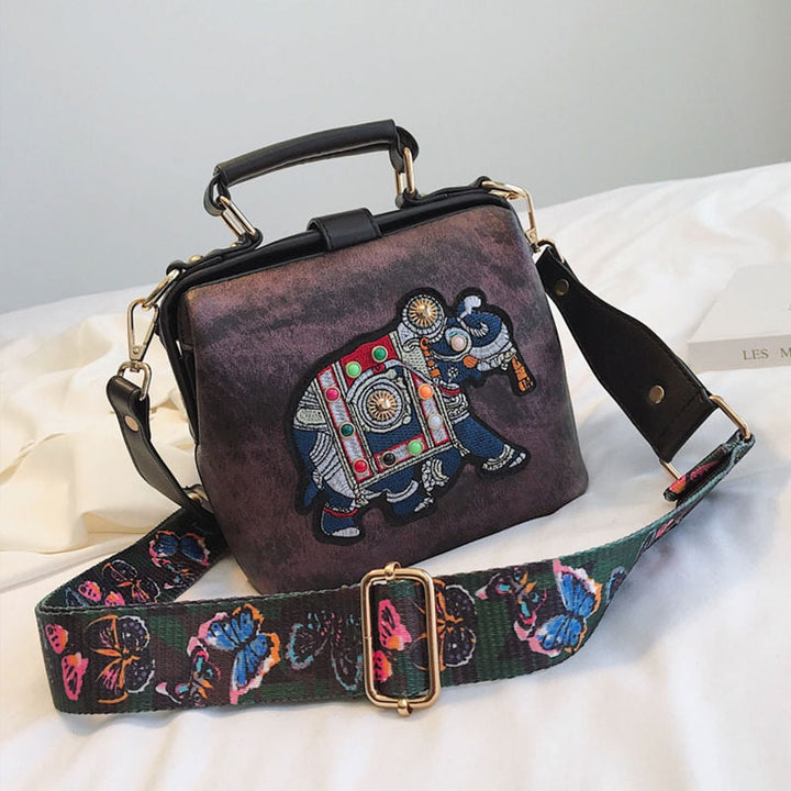 Women's mandala shoulder bag, intricately embroidered bohemian design.