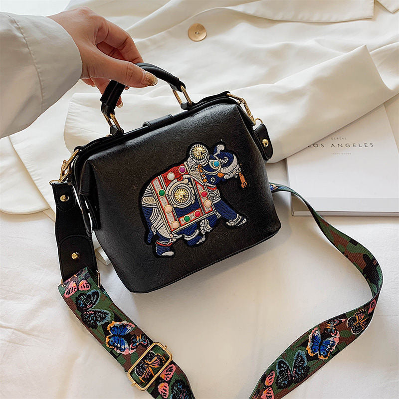 Versatile women's embroidered handbag, lightweight with a unique mandala pattern.