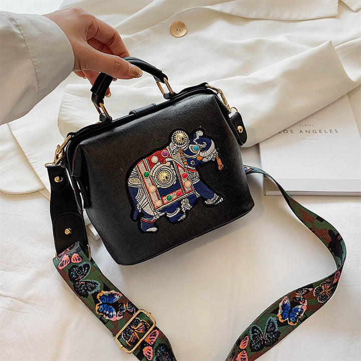 Versatile women's embroidered handbag, lightweight with a unique mandala pattern.