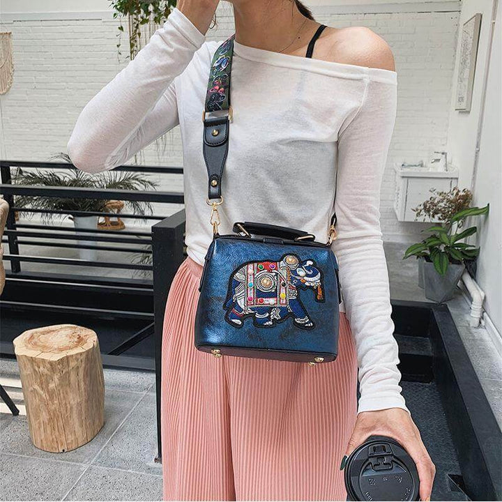 Lightweight women's bohemian bag with vibrant mandala embroidery.