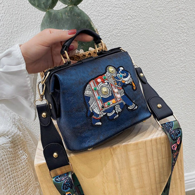 Lightweight ethnic embroidered shoulder bag for women, multi-use design.