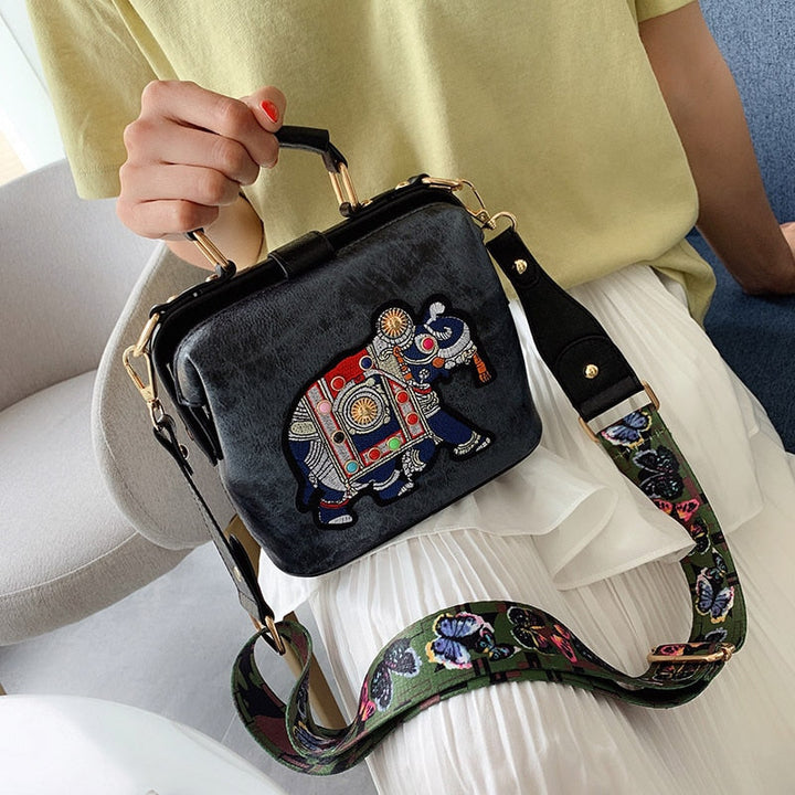 Chic women's mandala handbag, featuring vibrant bohemian embroidery.