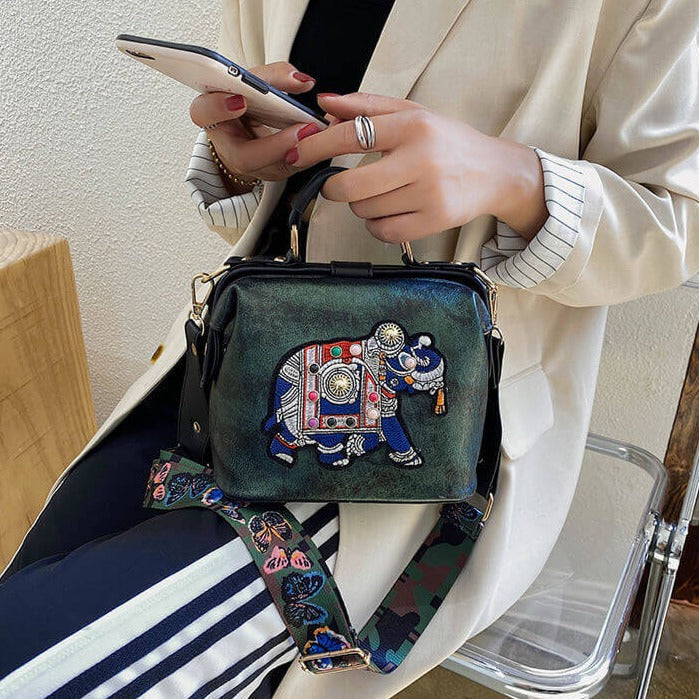 Embroidered bohemian shoulder bag with a unique mandala pattern for women.