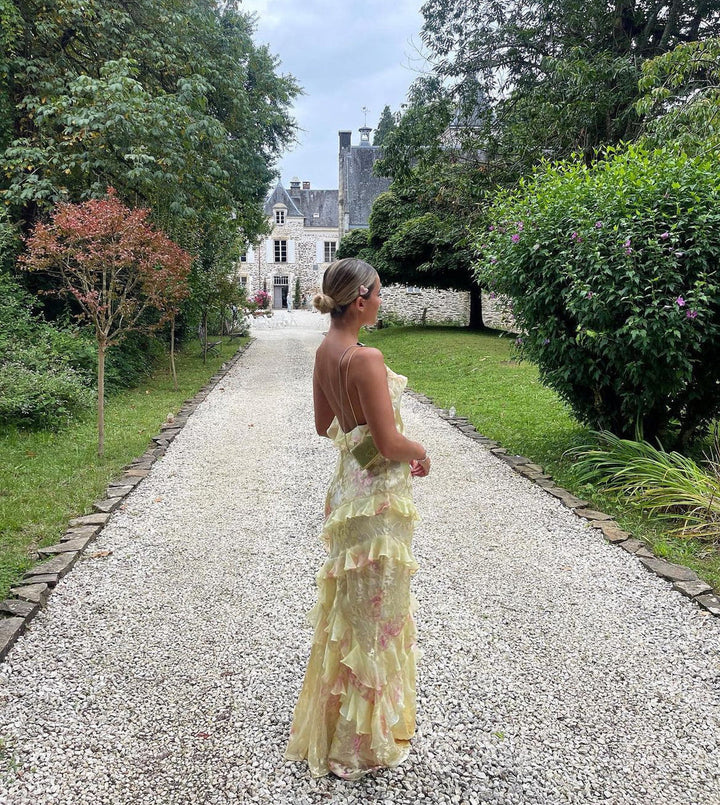 Pastel women's flowy ruffle maxi dress. An elegant summer dress with open back for evening and party wear.