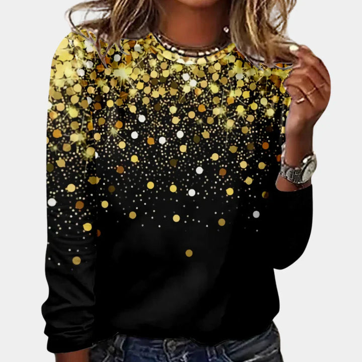 Holiday fashion women's festive top, snowflake pattern, soft winter sweater for comfortable seasonal style.