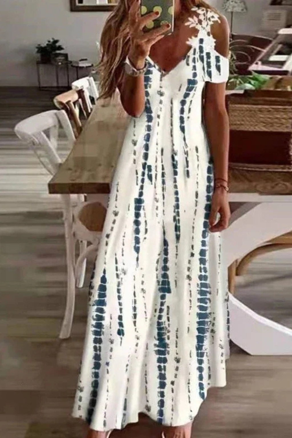 Versatile women's floral cold-shoulder maxi, perfect for elegant or casual summer wear.