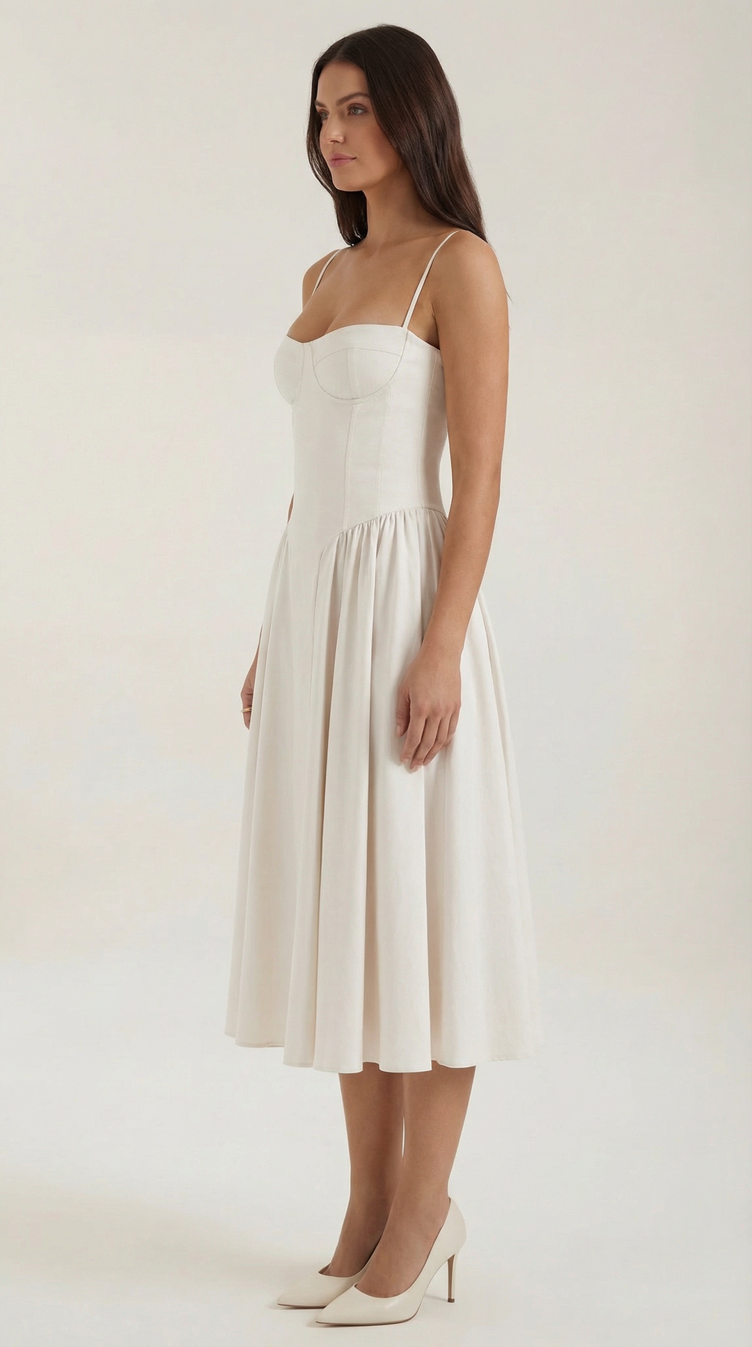 Women's floral midi dress with structured corset top, ideal for summer elegance.