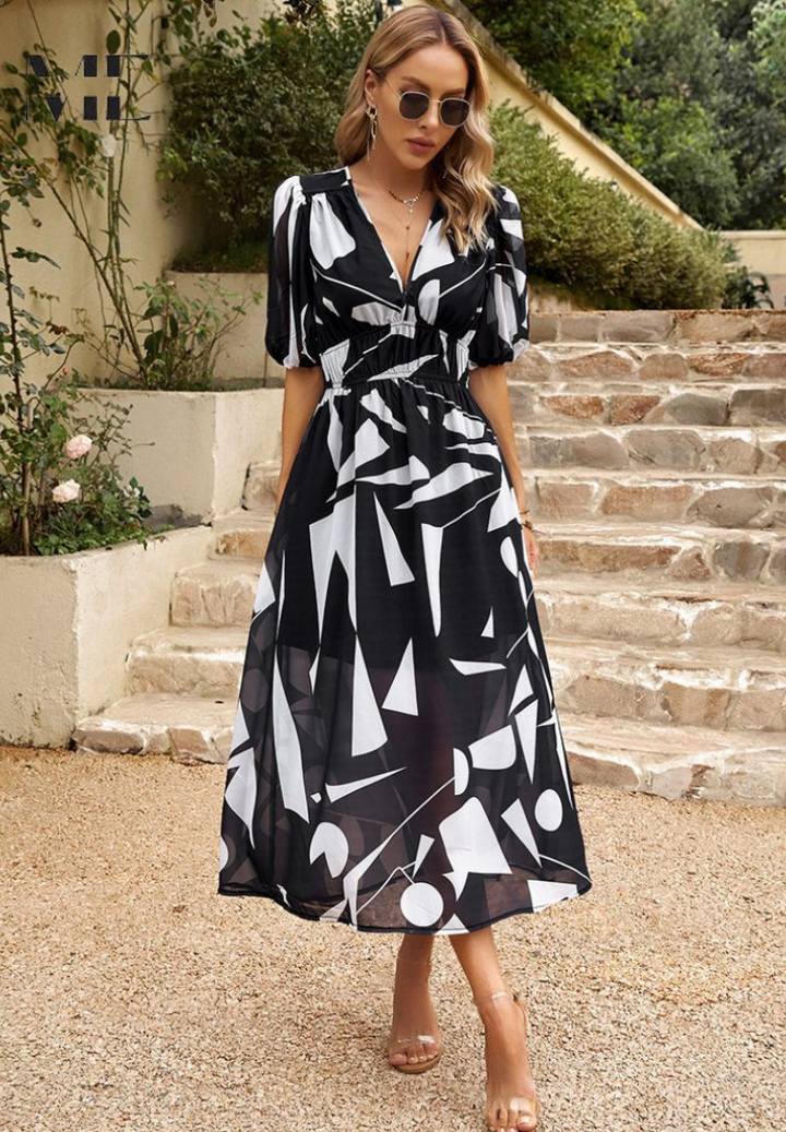 Chic women's V-neck floral midi dress with puff sleeves, A-line cut for comfortable summer wear.