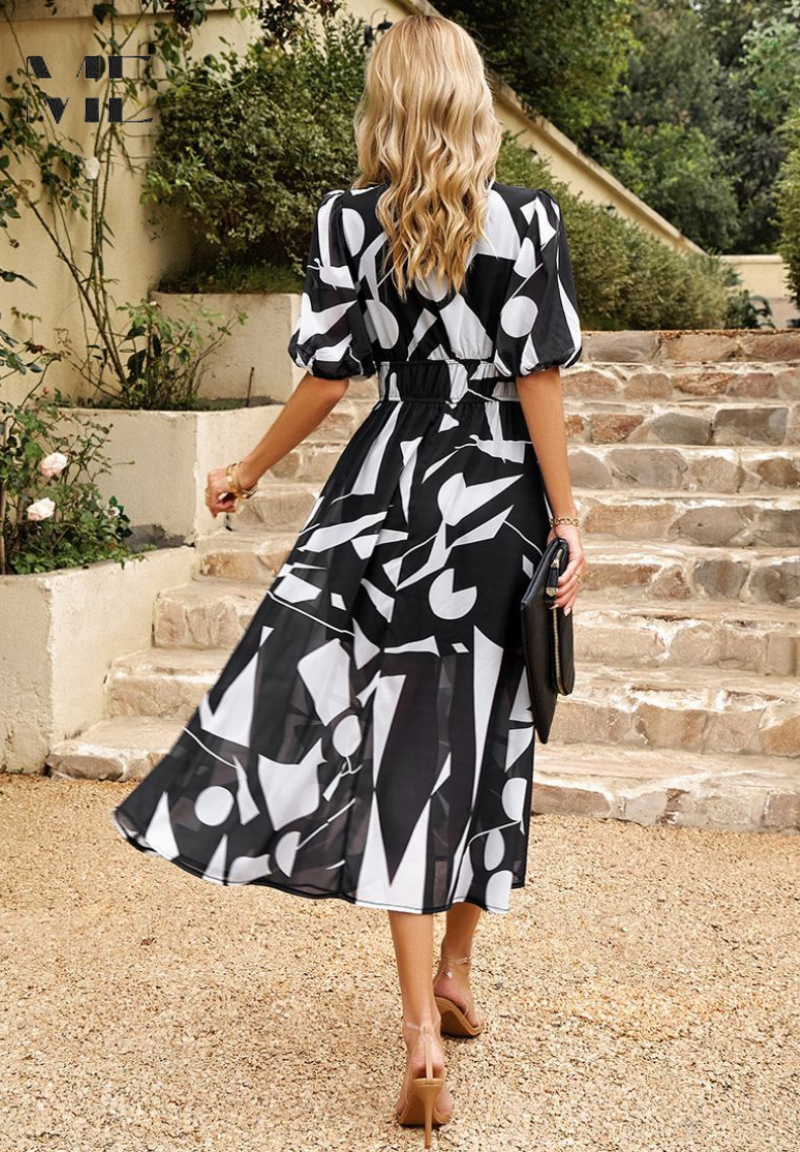 Lightweight women's floral midi dress, puff sleeves, V-neck; ultimate comfort for summer fashion.