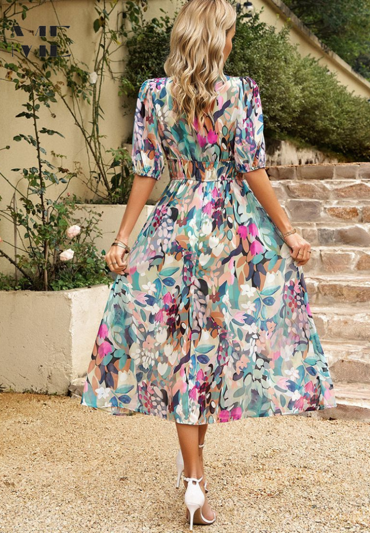 Casual women's A-line floral midi dress with puff sleeves and a flattering V-neck for summer.