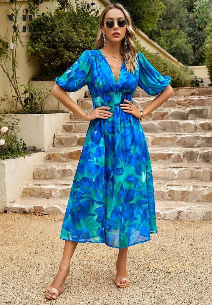 Breezy women's floral V-neck midi dress with puff sleeves, a must-have for summer fashion.