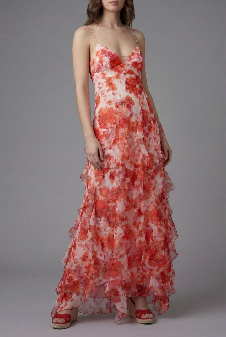 Elegant women's floral maxi dress for summer, featuring ruffles, spaghetti straps, and a backless, flowy design.