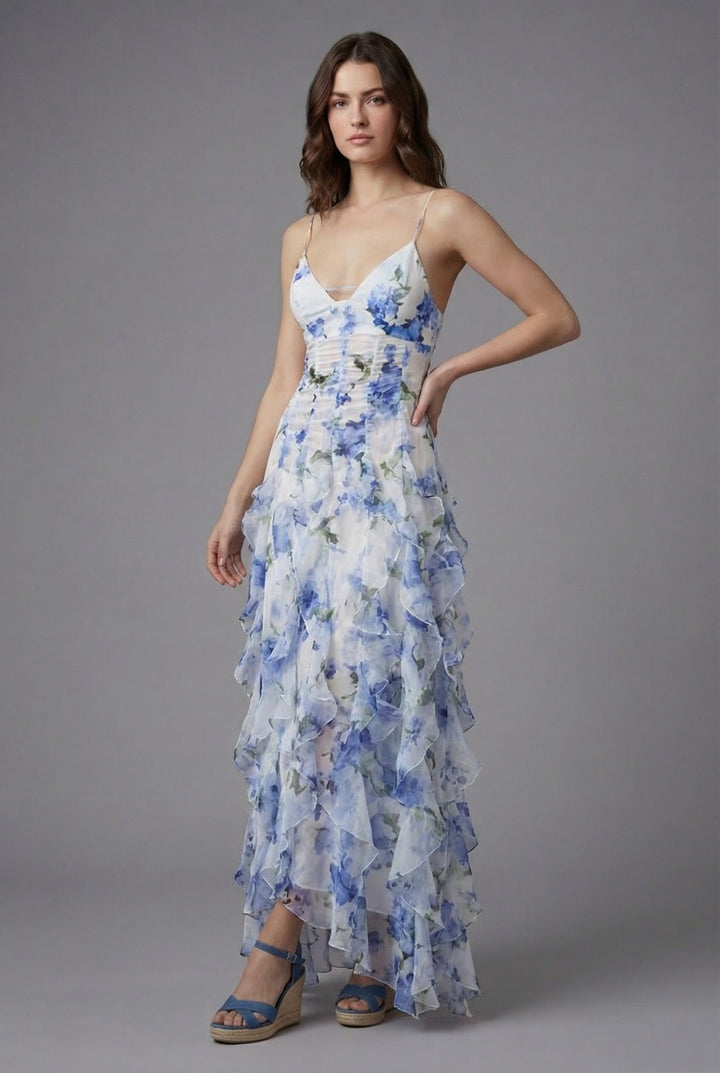 Stylish women's backless floral maxi dress with ruffles & spaghetti straps, ideal for resort wear or beach.