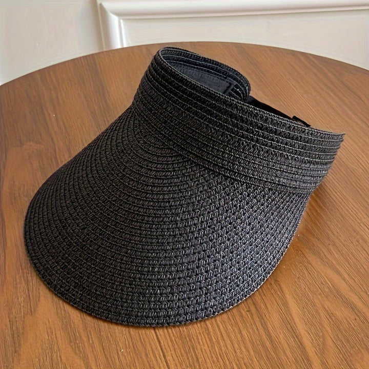 Foldable wide brim sun visor, designed for women's outdoor activities and maximum UV protection.