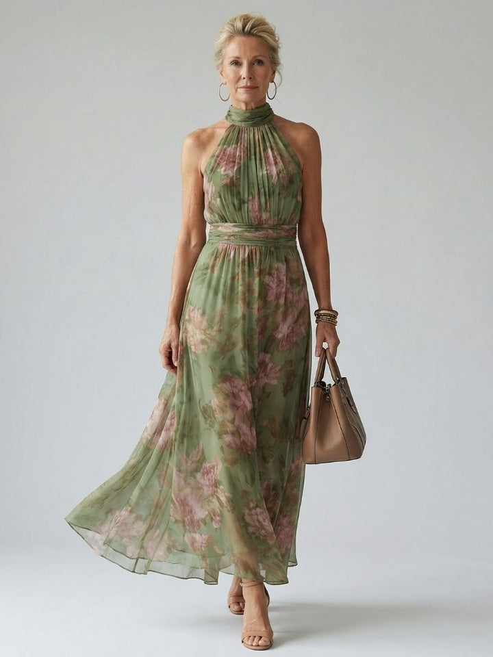 Women's gathered halter midi dress in a flowy style, perfect for summer days.