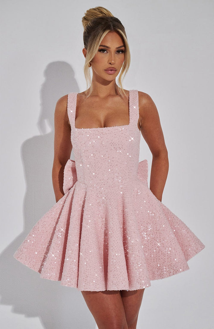 Women's glamorous sequin mini prom dress with square neck and elegant back bow, perfect for parties.