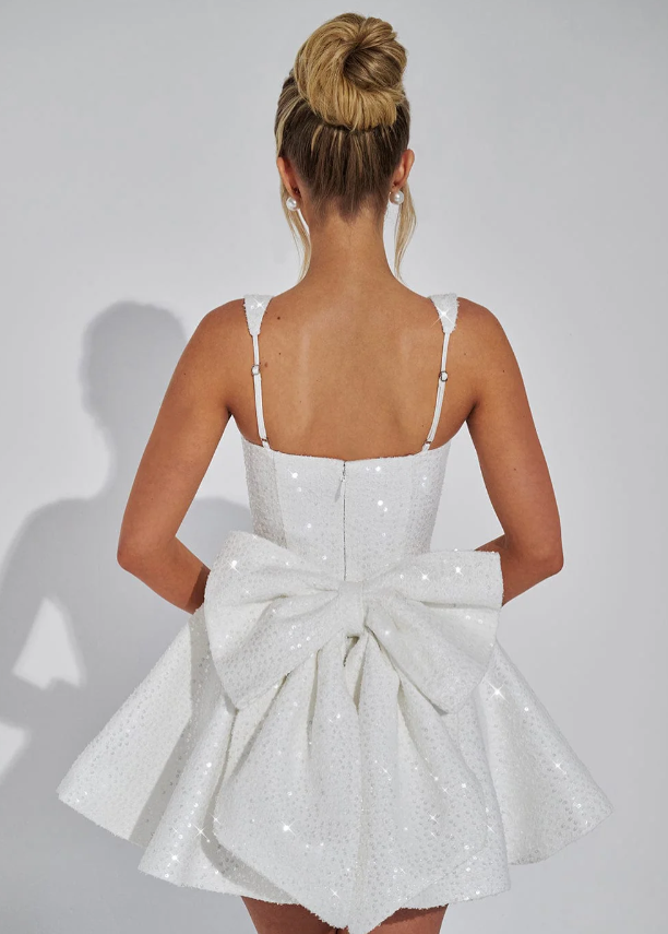 Stunning women's sequin cocktail mini dress, A-line cut with a chic square neckline and charming back bow.