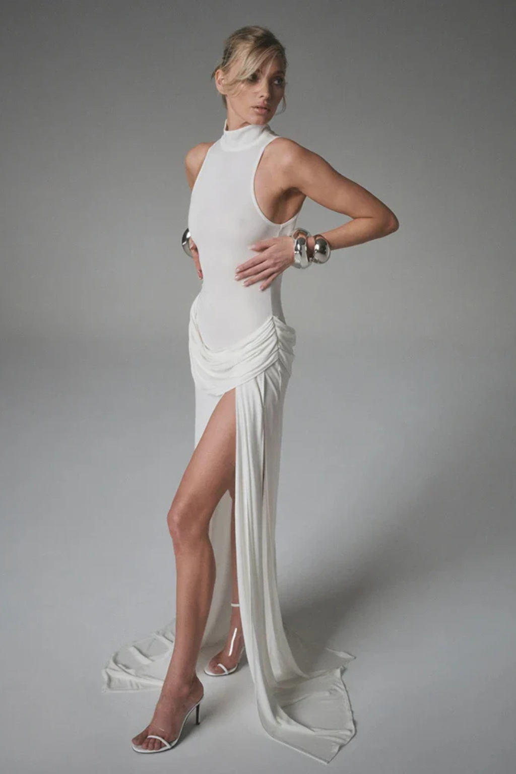 Flowy women's high neck sleeveless maxi dress with side split, a comfortable yet elegant party dress.