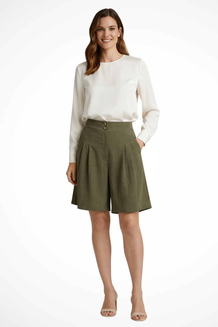 Elegant women's pleated high waist Bermuda shorts, perfect for warm weather & chic style.