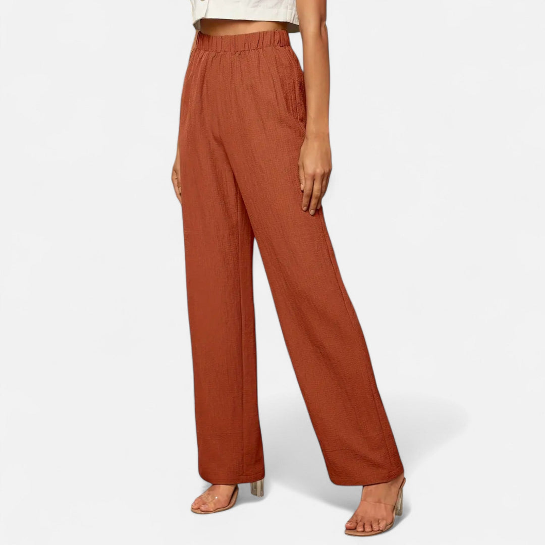 Women's high-waist straight-leg trousers, perfect for office or elegant wear.