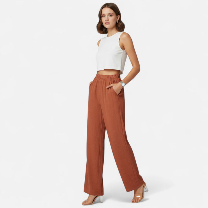 Classic high-waisted straight-leg trousers for women, offering a timeless and tailored look.