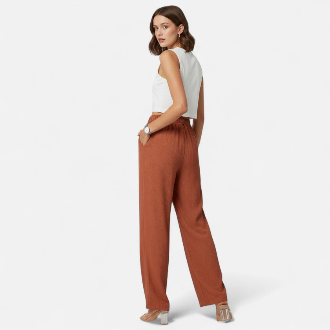 Versatile women's high-waist straight-leg pants, ideal for office, casual, or elegant outfits.
