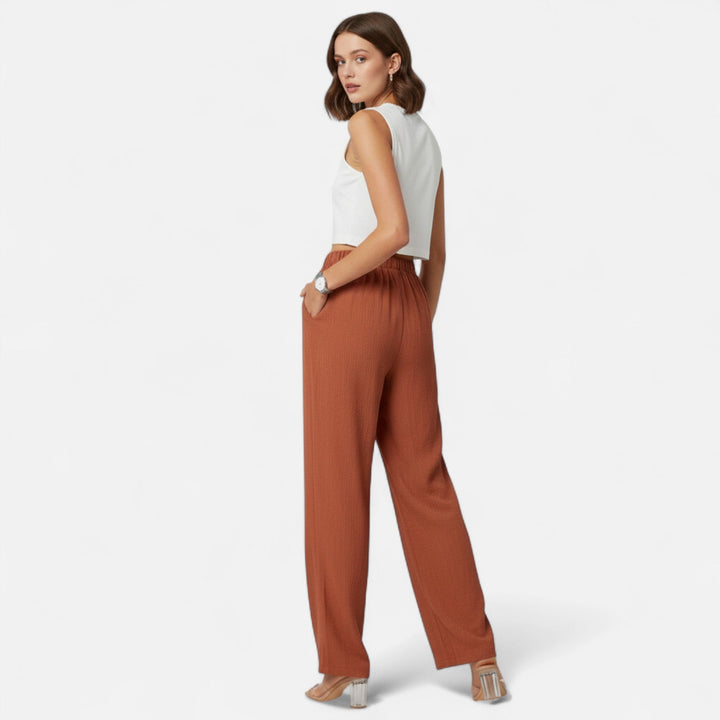 Versatile women's high-waist straight-leg pants, ideal for office, casual, or elegant outfits.
