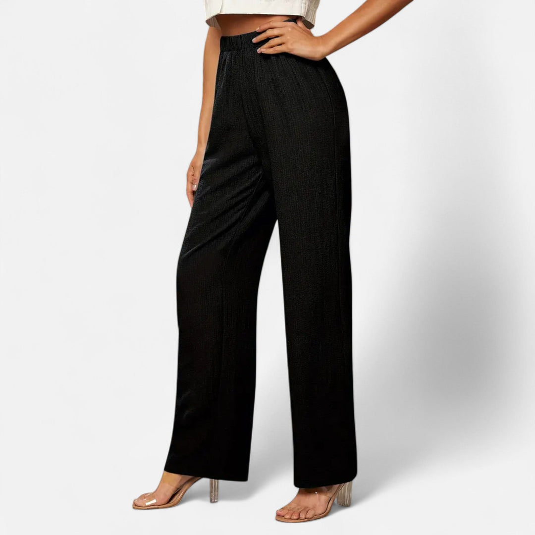 Flattering high-waist straight-leg tailored trousers for women, providing comfort and sophisticated style.