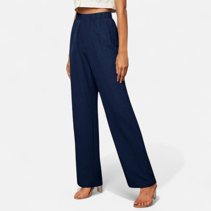 Women's straight-leg high-waist trousers for a classic, professional office wear look.