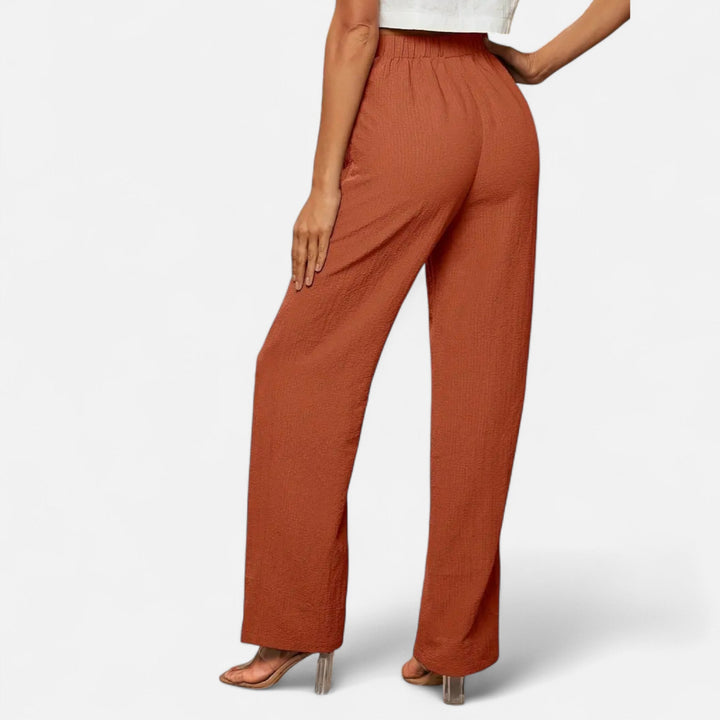 Elegant women's high-waist straight-leg tailored pants, a versatile addition to any wardrobe.