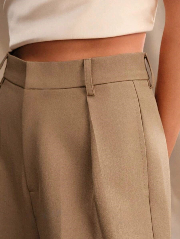Women's tailored wide leg trousers, high waist, comfortable for sitting, ideal for work.