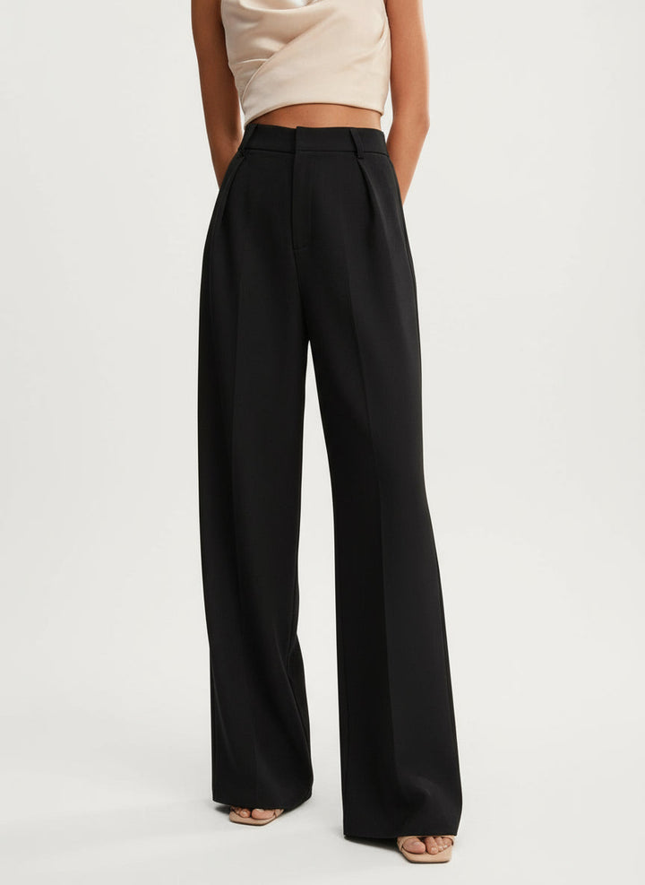 Elegant women's wide leg trousers flowing gracefully, high waist, perfect for work or special events.