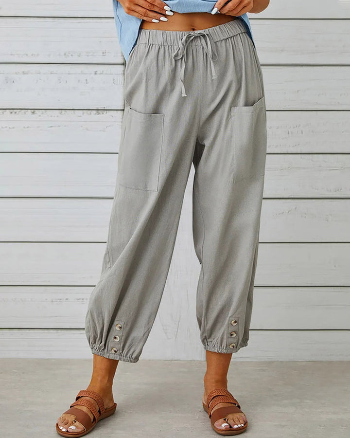 Chic women's high waist relaxed fit trousers in a versatile, comfortable style.
