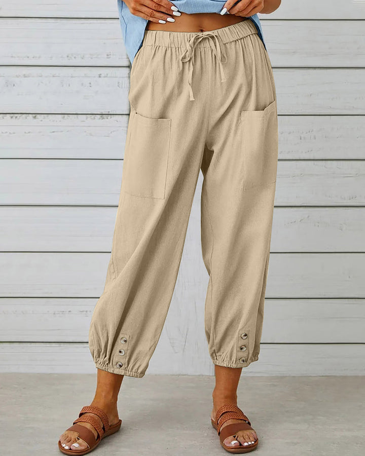 Stylish women's loose fit pants, high waisted for a modern, relaxed casual look.