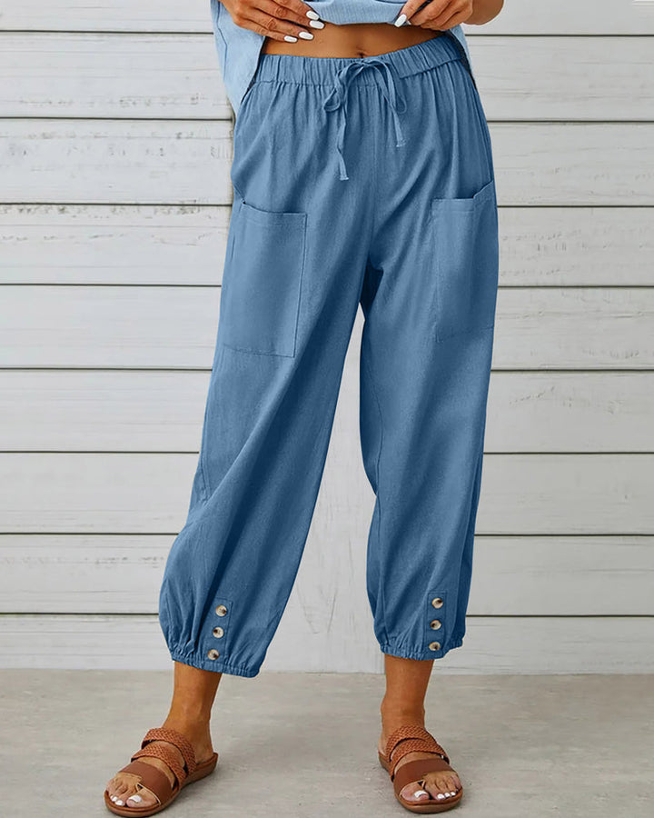 Everyday women's relaxed fit trousers, high waist and loose design for chic comfort.