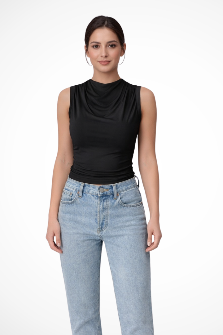 Stylish women's sleeveless peplum top with draped neckline. Perfect for office chic or sophisticated casual wear.