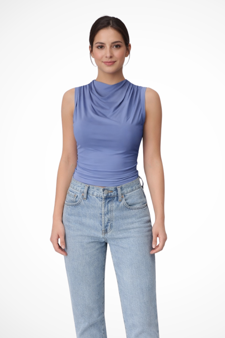 Elegant Kaia sleeveless blouse featuring a chic draped neck and flattering peplum hem. A versatile layering piece.