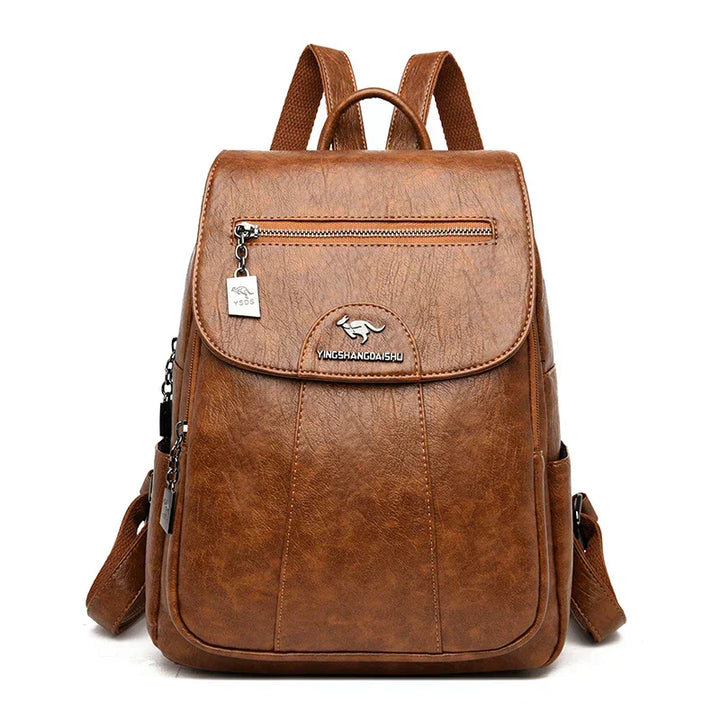 Front view of a women's large leather anti-theft backpack, a stylish and secure travel bag.