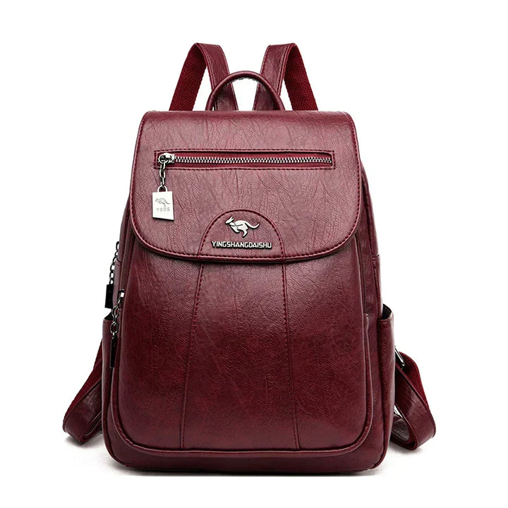 Detail of premium leather on a women's anti-theft backpack, a durable fashion essential.