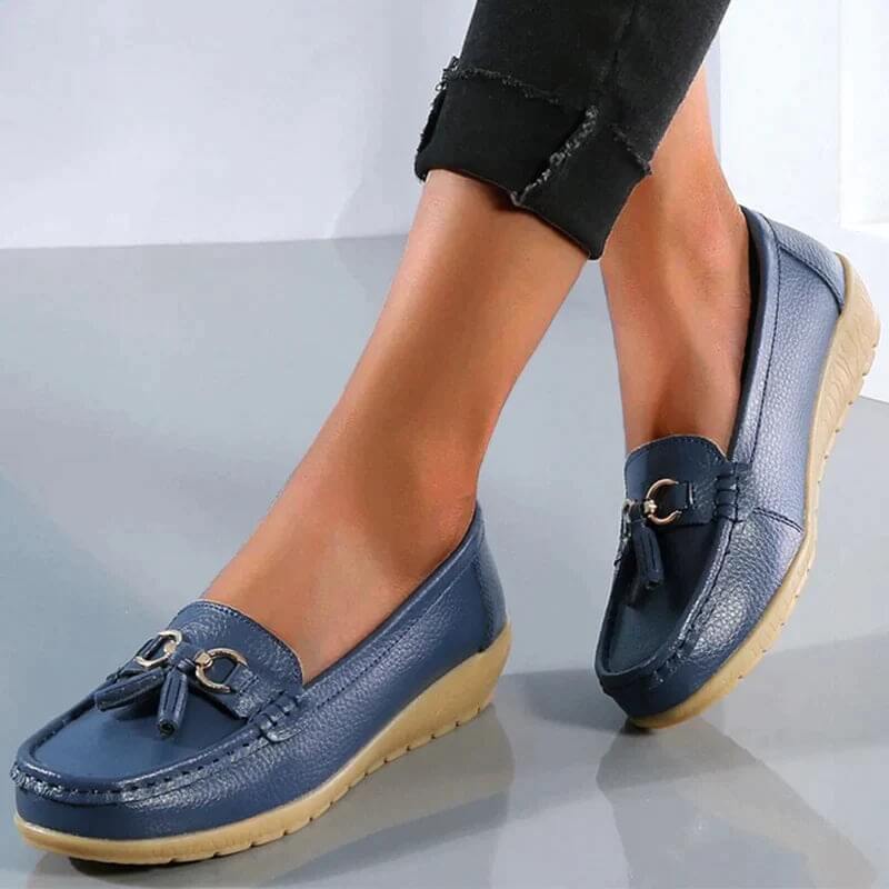 Comfortable women's slip-on loafers, a timeless flat shoe for elegant smart casual fashion.