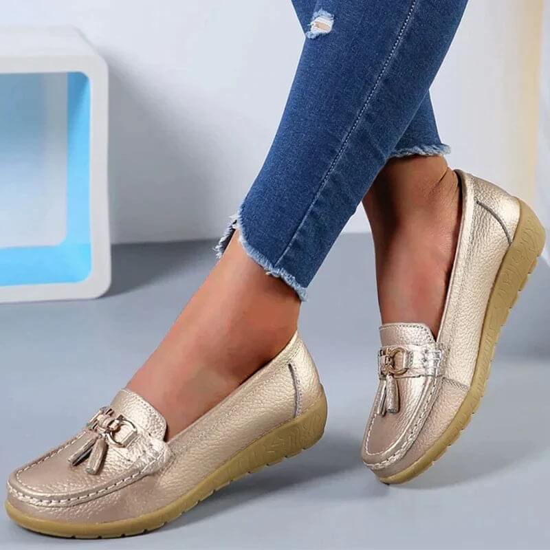 Leather slip-on loafers for women, offering timeless elegance and comfortable everyday style.