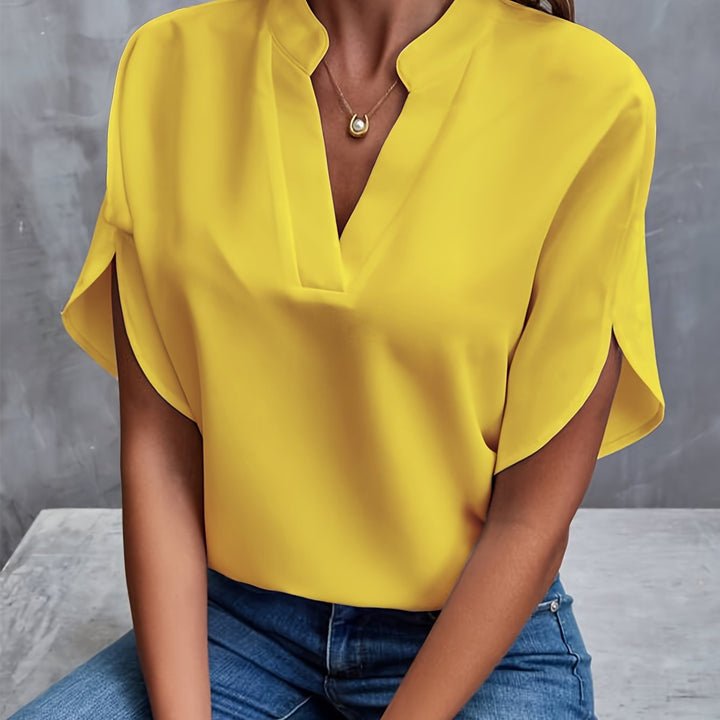 White long sleeve women's blouse, lightweight and elegant, perfect for versatile spring workwear.