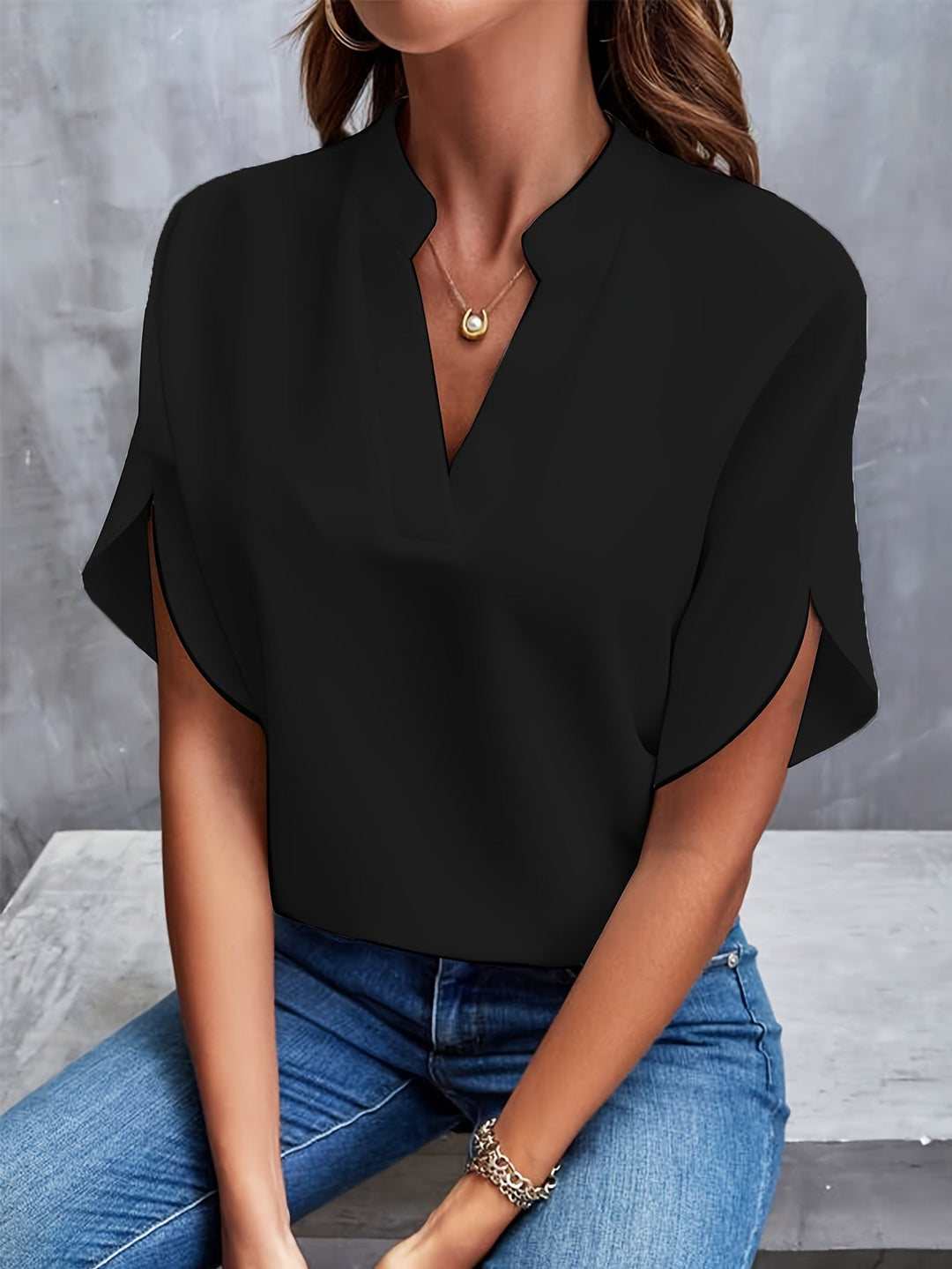 Elegant white women's blouse, a lightweight top for versatile casual chic and professional workwear.