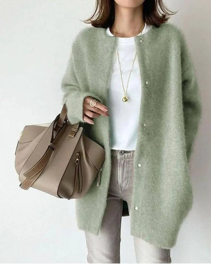 Chic women's open-front cardigan with long sleeves. Ideal for transitional spring and fall fashion layering.